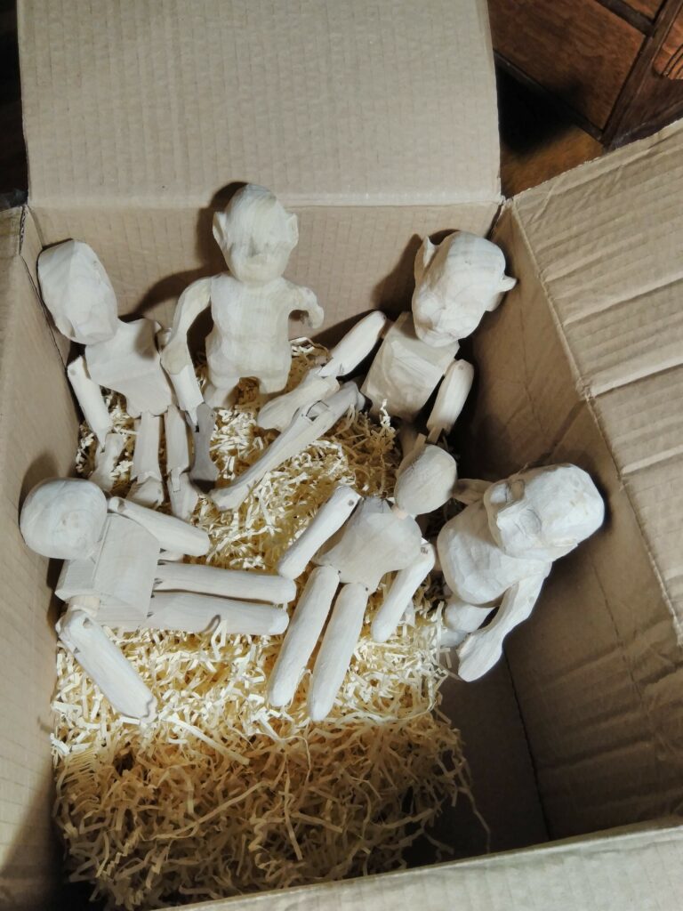hand carved wooden dolls