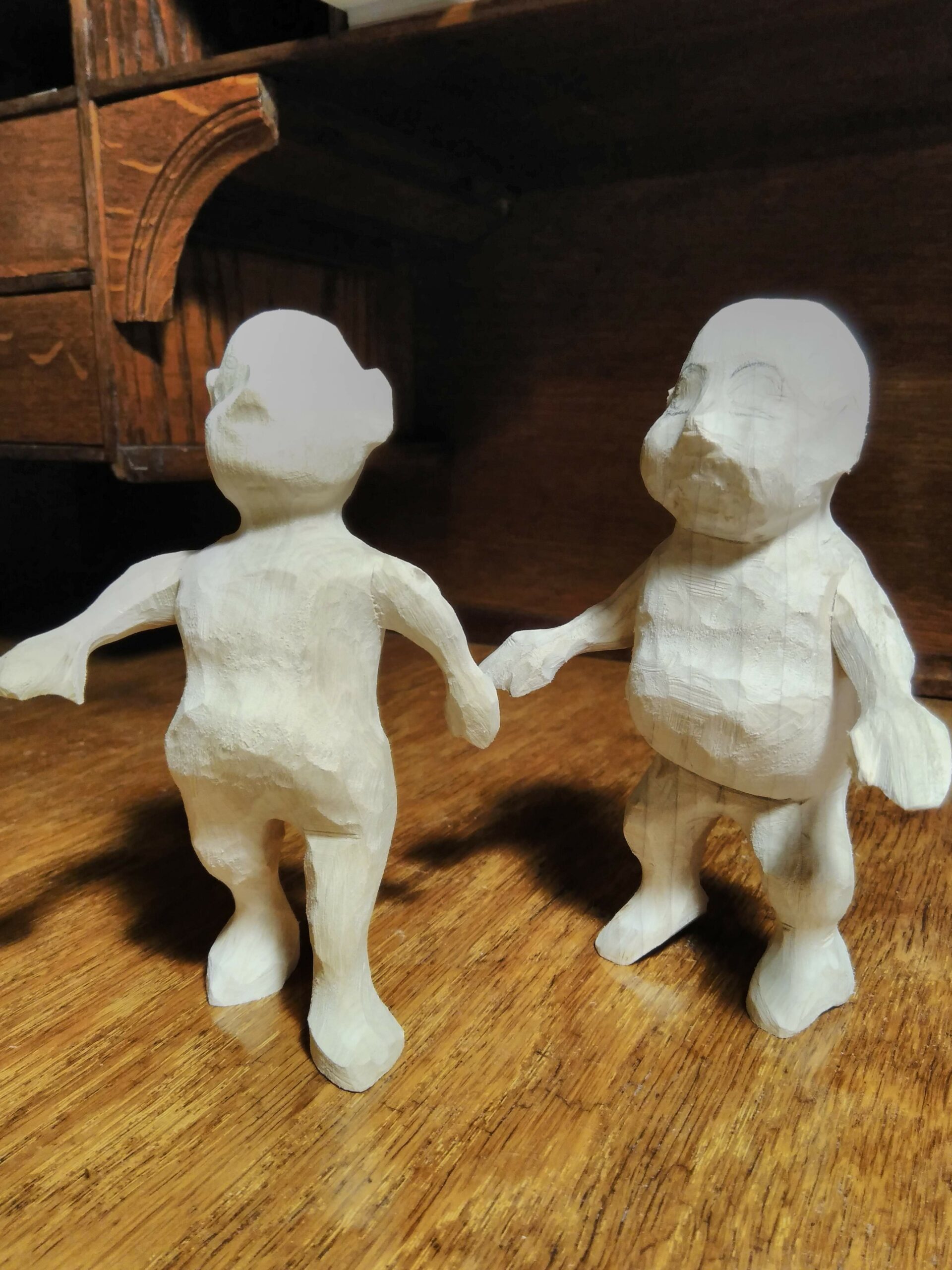 Hand carved wooden dolls