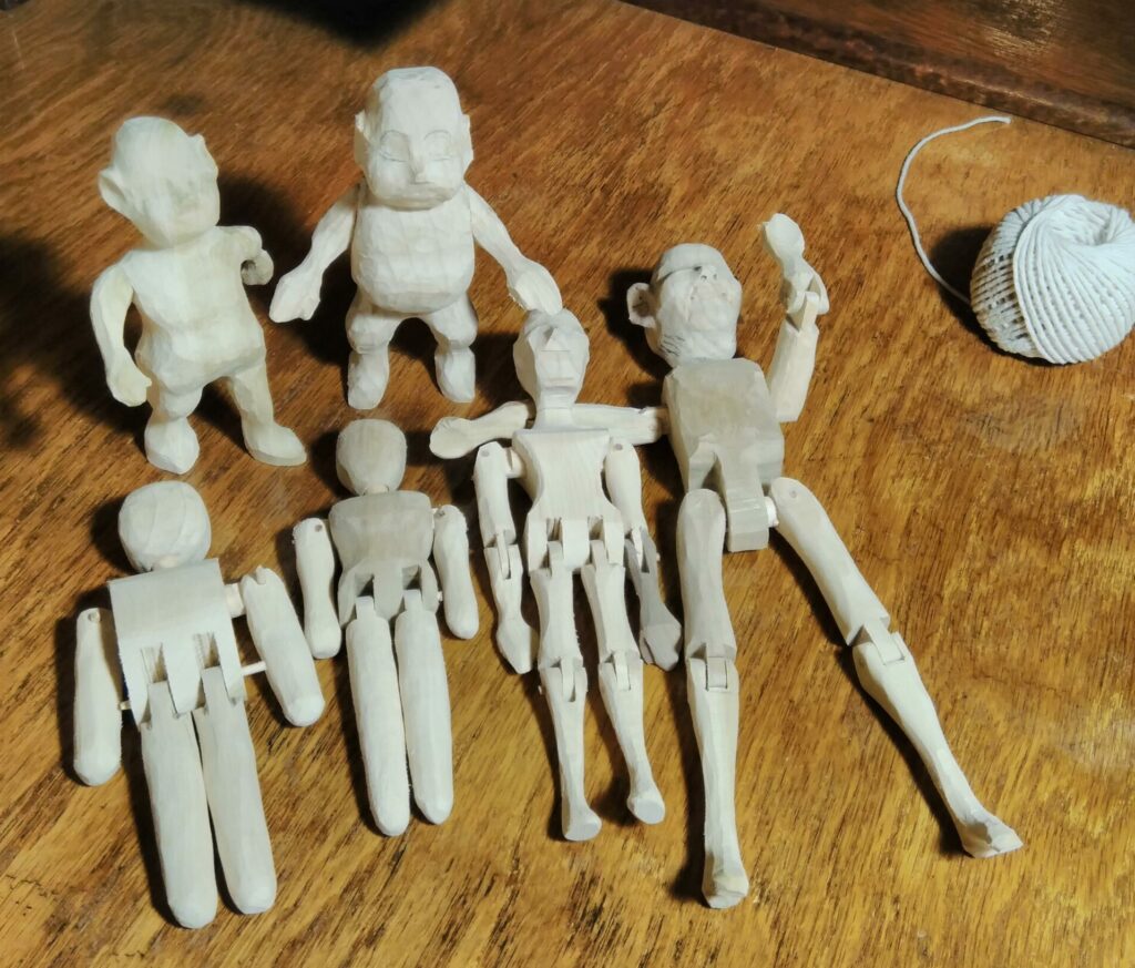 Hand carved wooden dolls