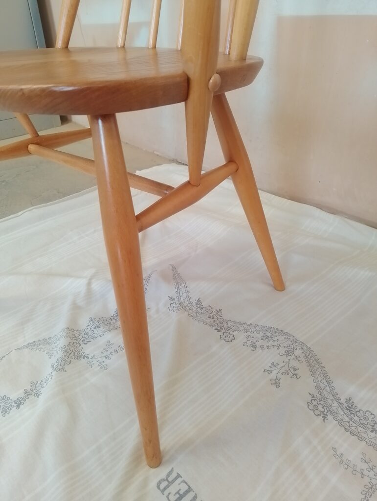 Close-up of Ercol Goldsmith armchair showing leg and arm joints