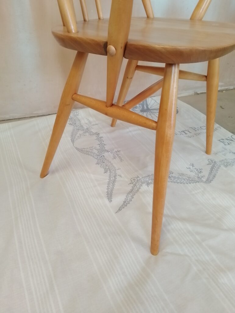 Close-up of Ercol Goldsmith armchair showing leg and arm joints