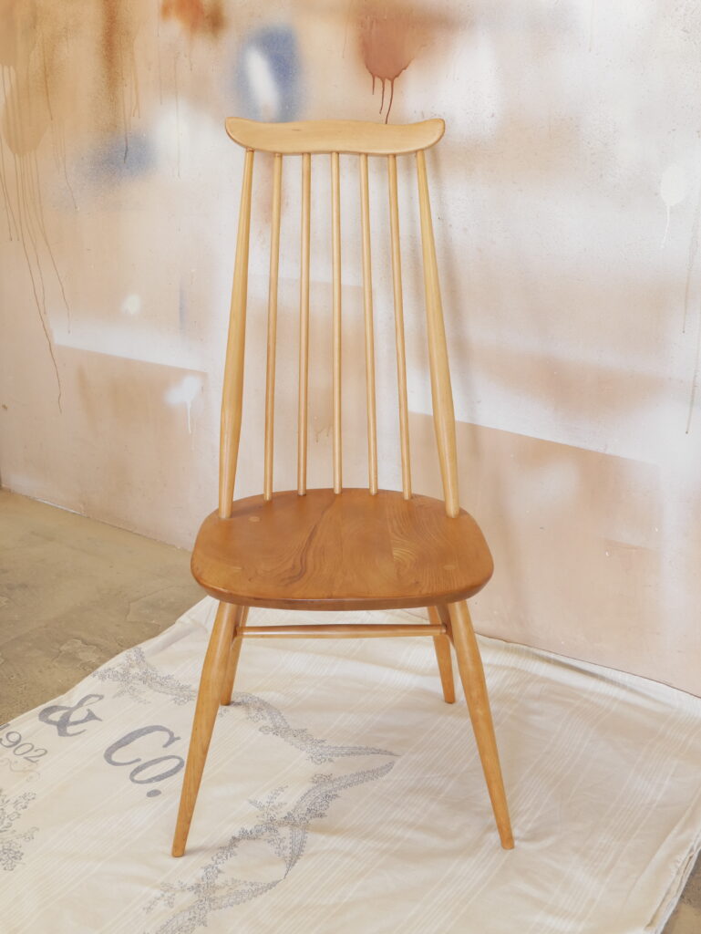 Front view of restored Ercol Goldsmith chair with elegant wooden frame